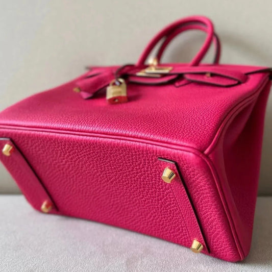 Sac à main en cuir rose fushia avec cadenas – maison mathurine