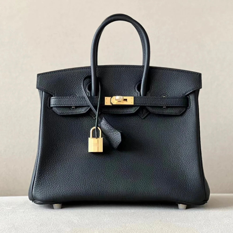 Sac à main en cuir noir avec cadenas doré – Maison Mathurine