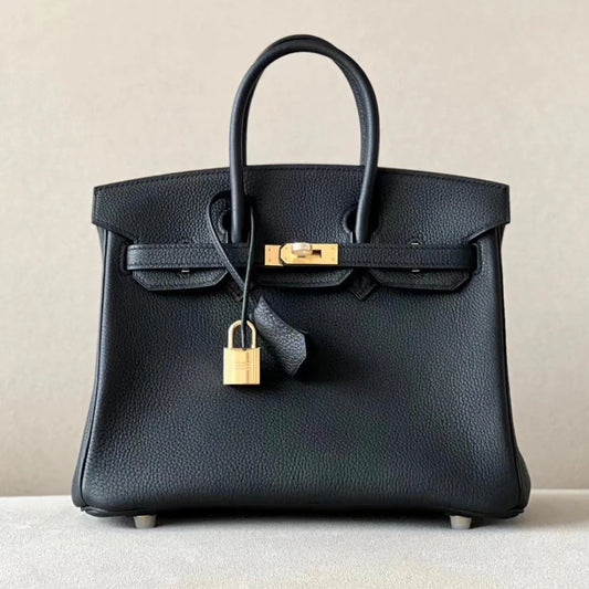 Sac à main en cuir noir avec cadenas doré – Maison Mathurine