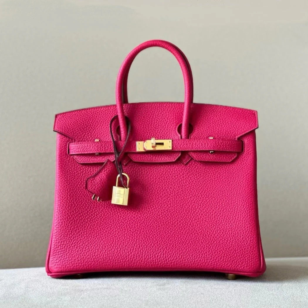 Sac à main en cuir rose fushia avec cadenas – maison mathurine