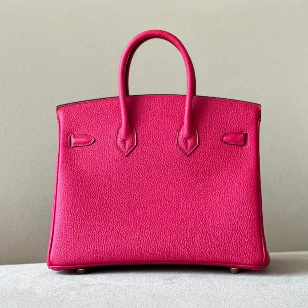 Sac à main en cuir rose fushia avec cadenas – maison mathurine