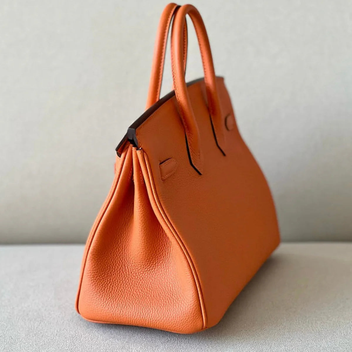 Sac à main en cuir orange brûlé avec cadenas – maison mathurine