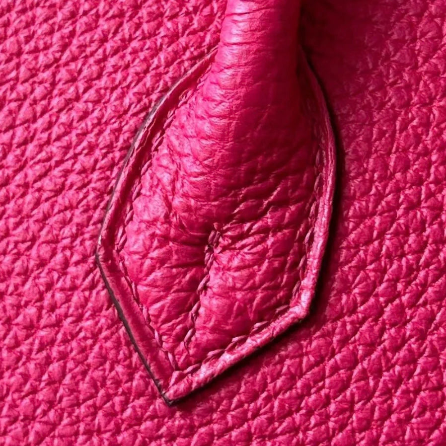 Sac à main en cuir rose fushia avec cadenas – maison mathurine